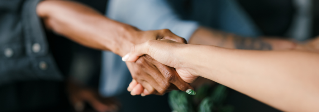 Two people shaking hands