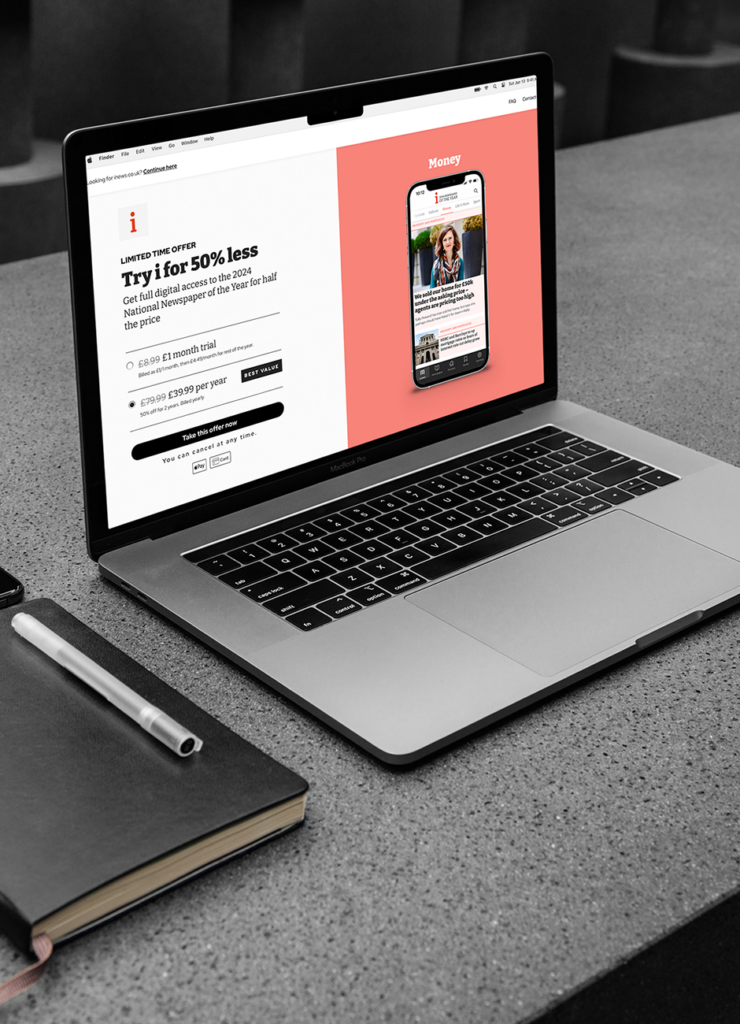 Laptop displaying a news subscription landing page alongside audience growth and engagement performance results.